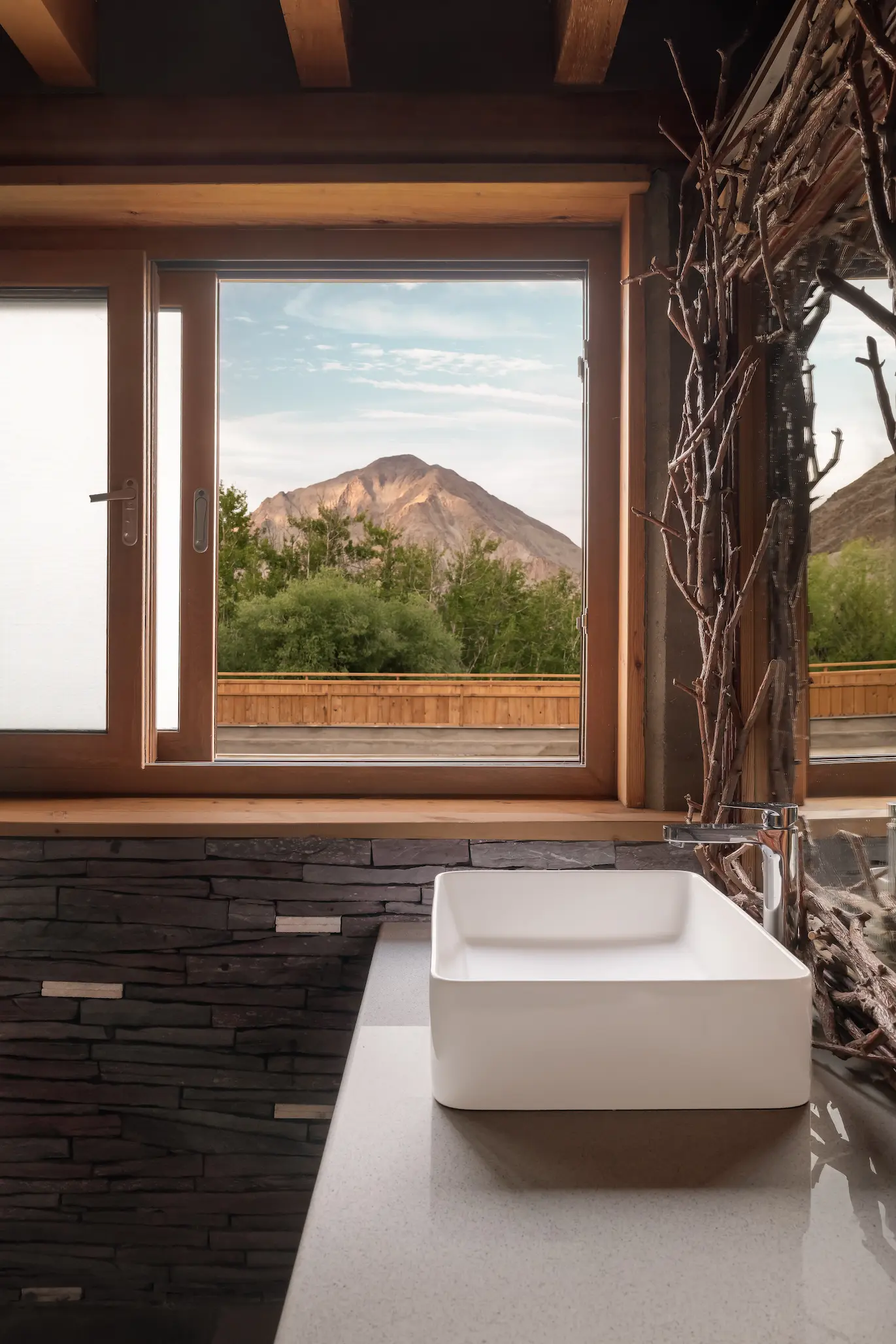 Eurasian Lynx Room Yamang stone bathroom at Chemday House Ladakh